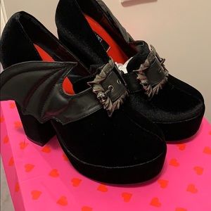 Iron Fist Nocturnal platform “bat wing” heels